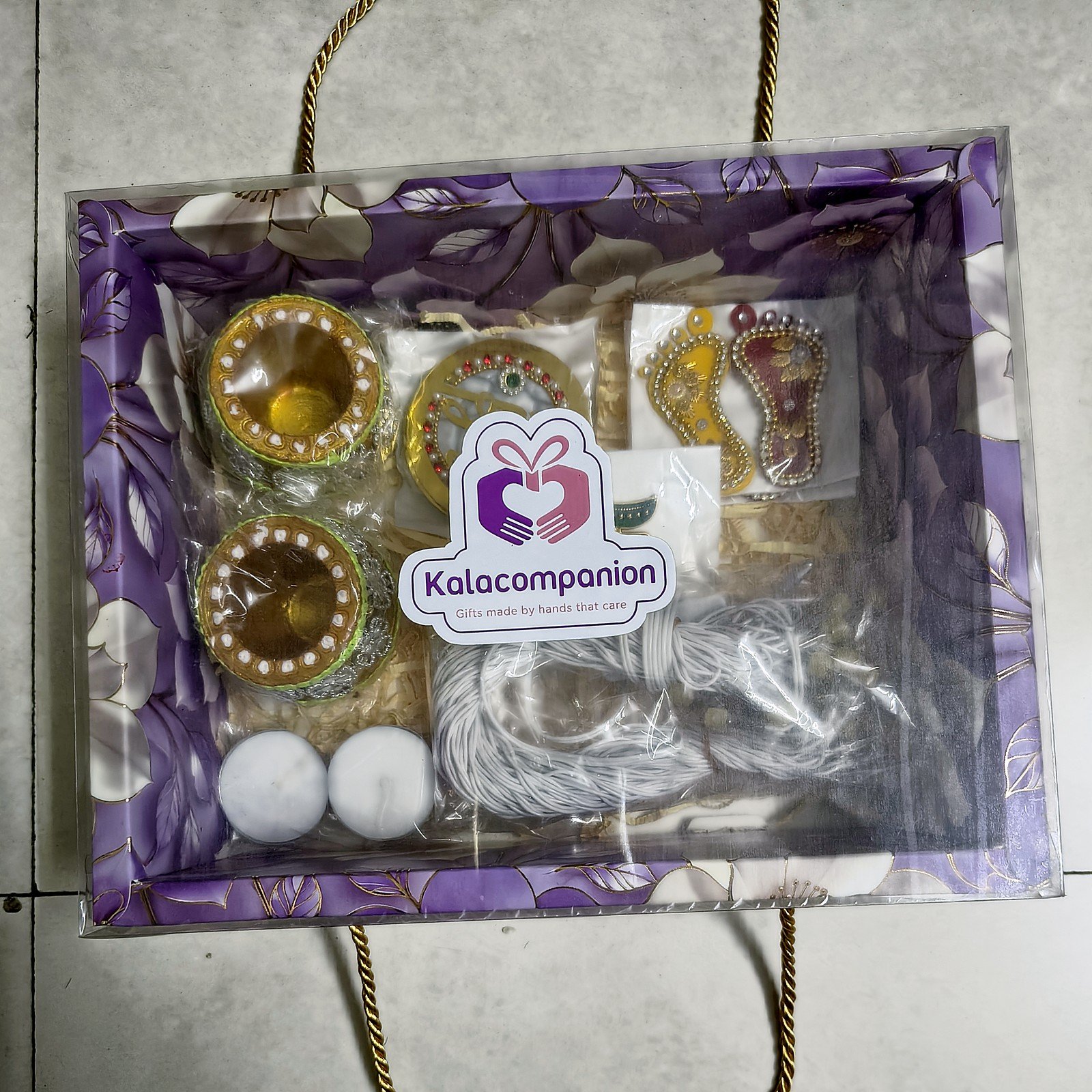 Roshni Matka Diya Hamper, packed in the floral gift box