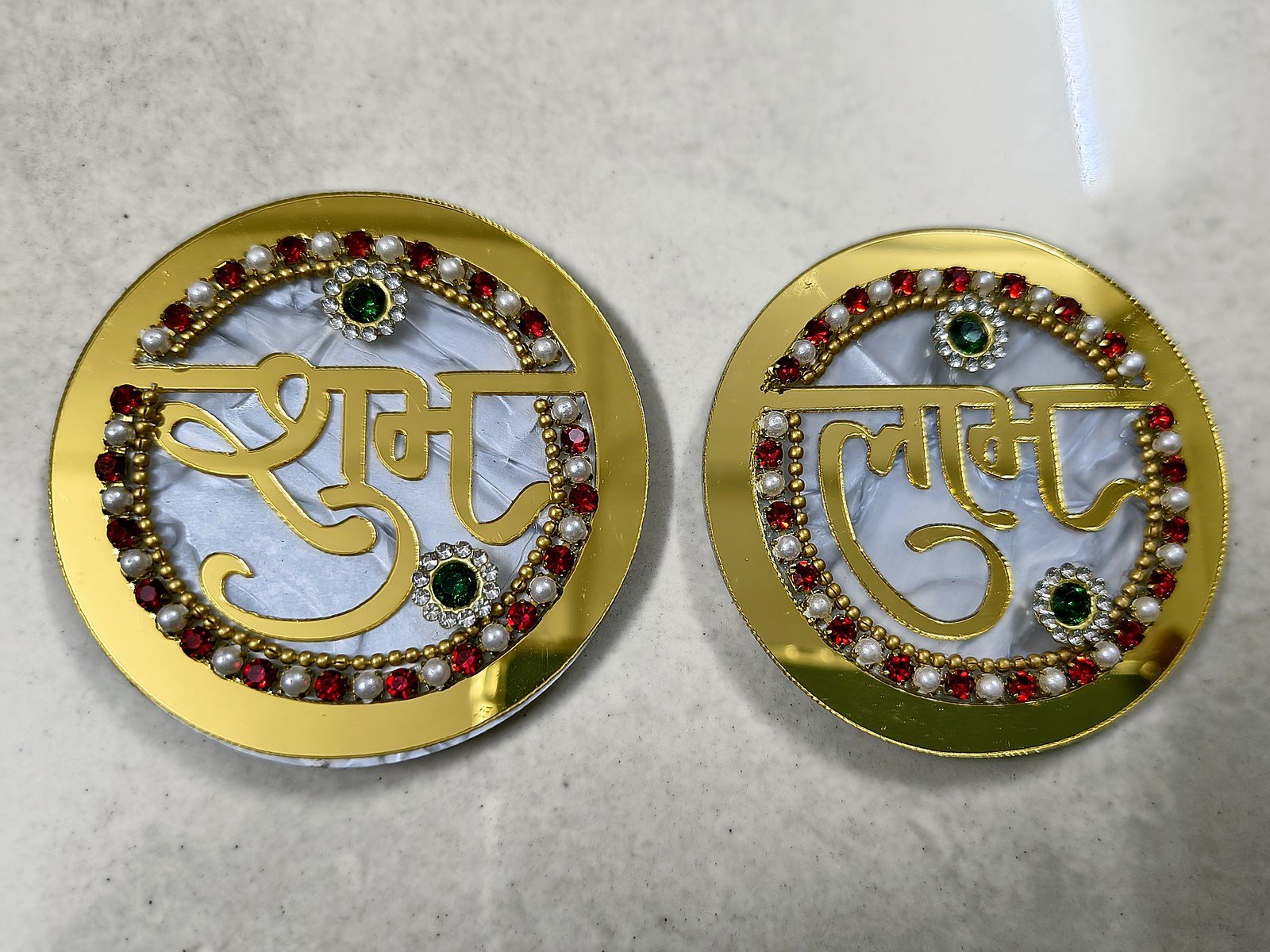 Round golden Shubh and Labh plaques