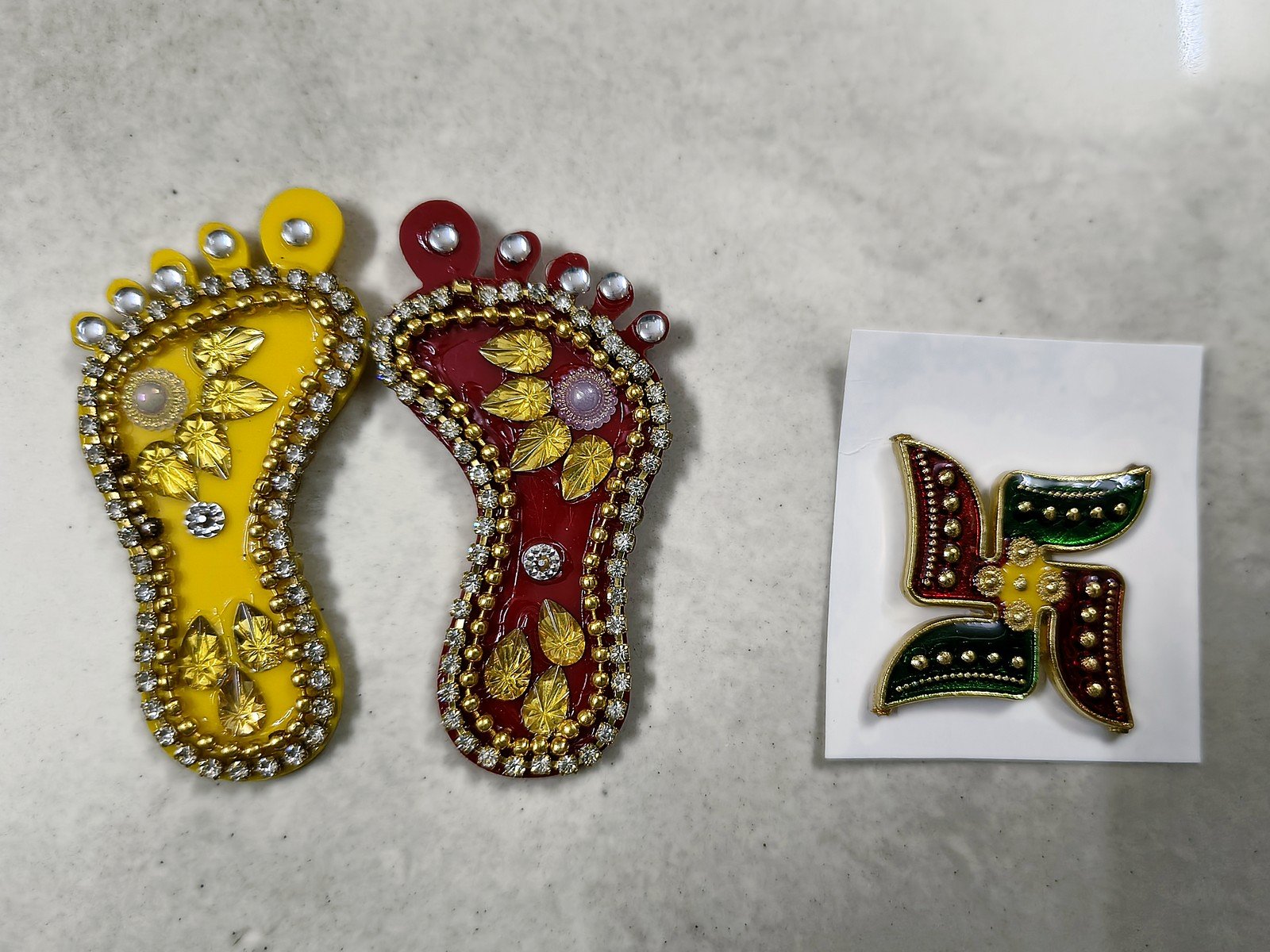 Laxmi pagla (yellow and red) and swastik