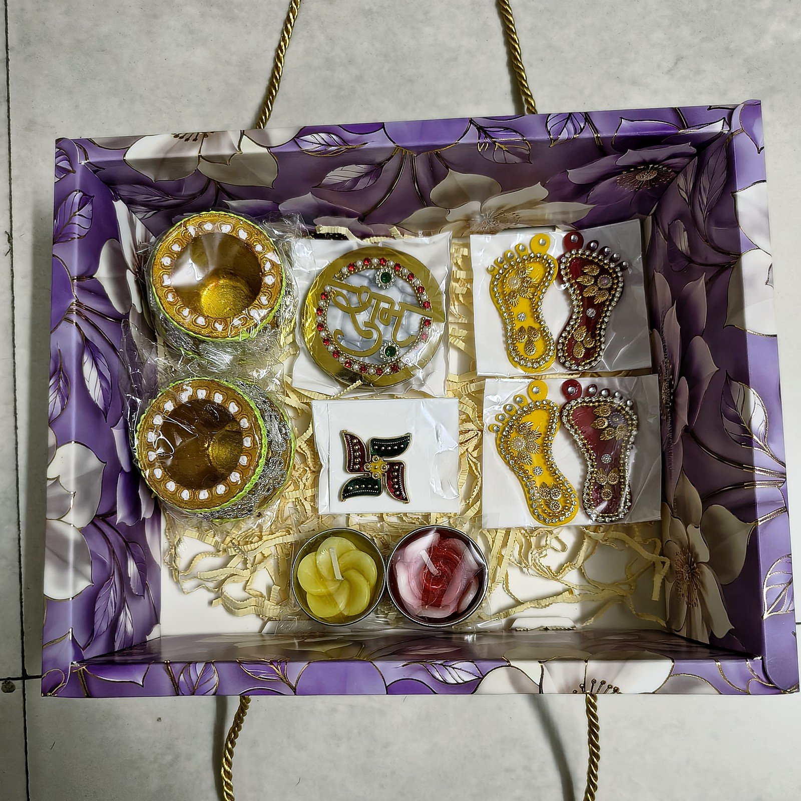 Tarang Matka Diya Hamper, open box with floating candles and all items