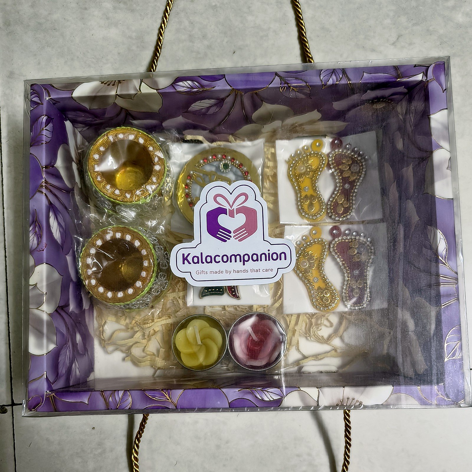 Tarang Matka Diya Hamper, packed in the floral gift box