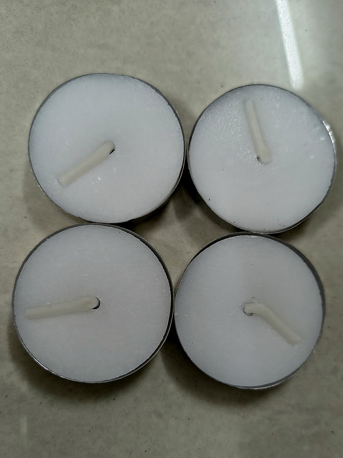 Swarna Roshni Golden Diya Hamper: four tealights