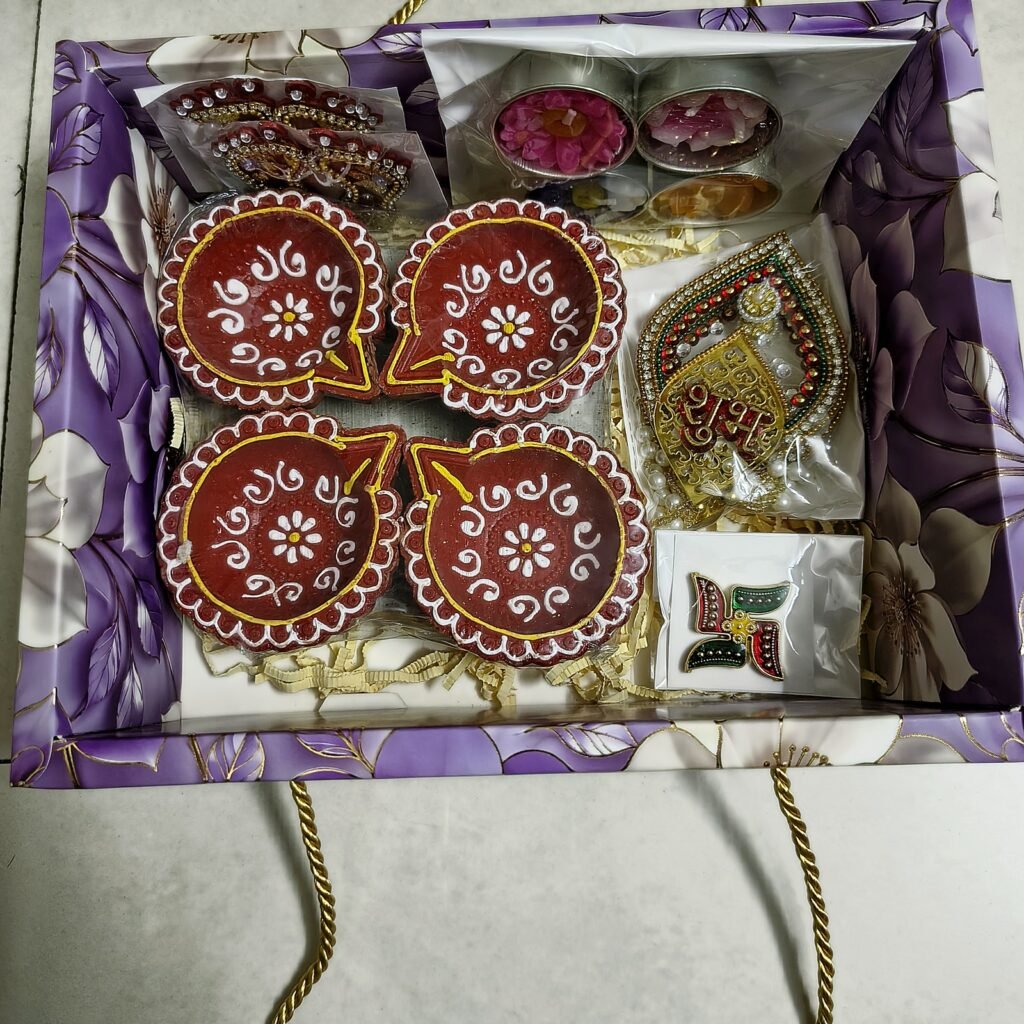 Mangal Tarang Red Diya Hamper: open box showing all items