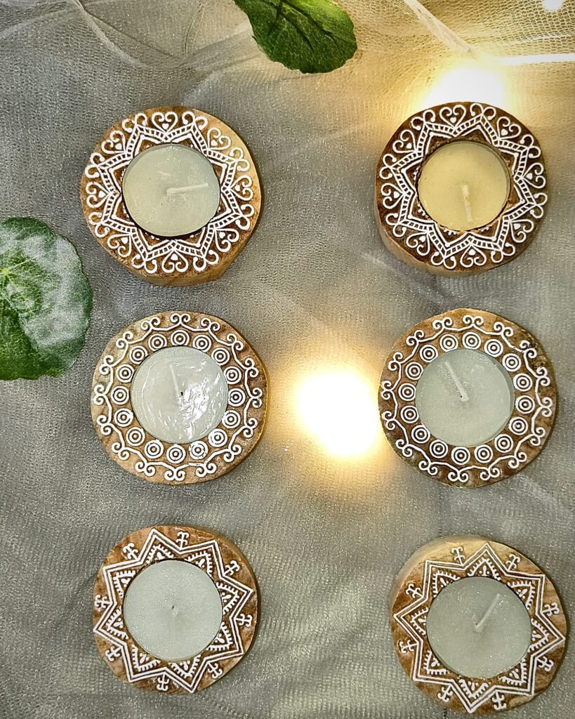 Kaath Kala set of 6 hand-carved round wooden tealight holders